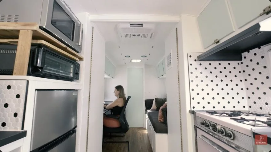 The finished kitchen and living space inside our renovated Avion