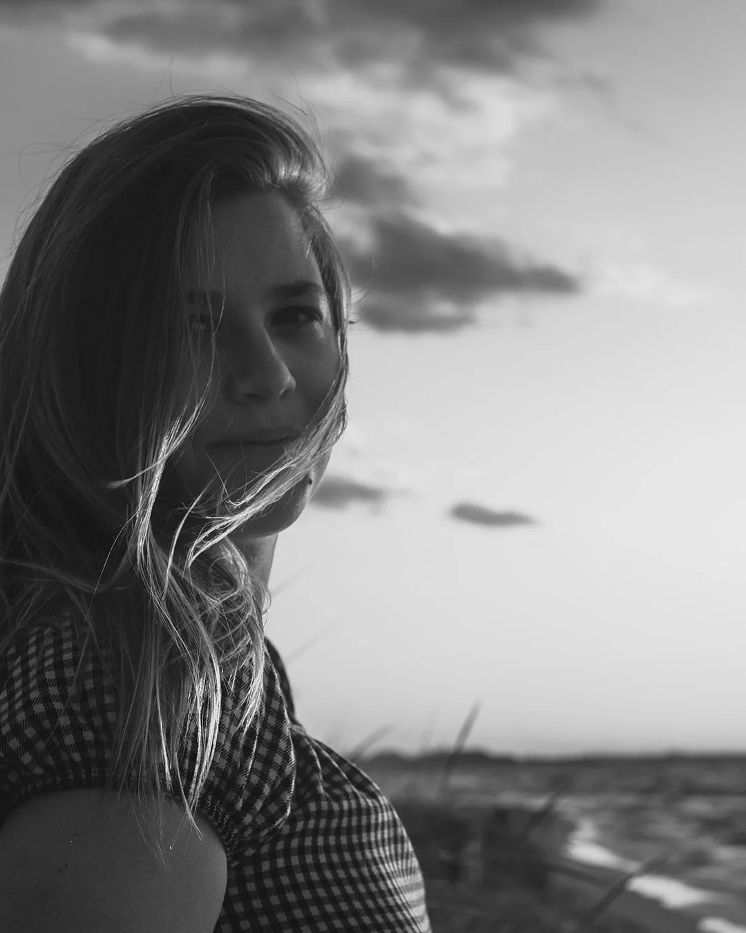 Black and white portrait of Sofia at Indiana Dunes